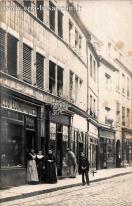 Carte postale ancienne - Besançon - Rue Battant - Les Économiques (Succursale n°...