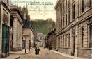 Carte postale ancienne - BESANÇON - La Faculté, le Théâtre et la rue Mégevand