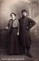 Carte postale ancienne Besançon - A. Dufour - BESANÇON - Jeune femme et militaire