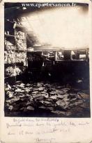 Carte postale ancienne - Dégâts dans les archives. Bombe tombée sur la poste la ...