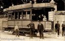 Carte postale ancienne - BESANÇON - Rue de la Liberté - Tramway devant le Cimeti...